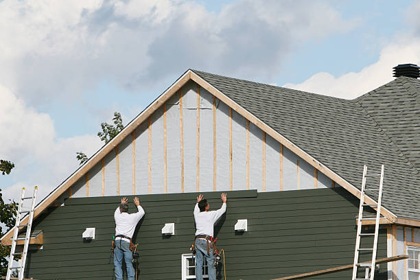 Professional Storm Damage Siding Repair technician working in Turin, GA